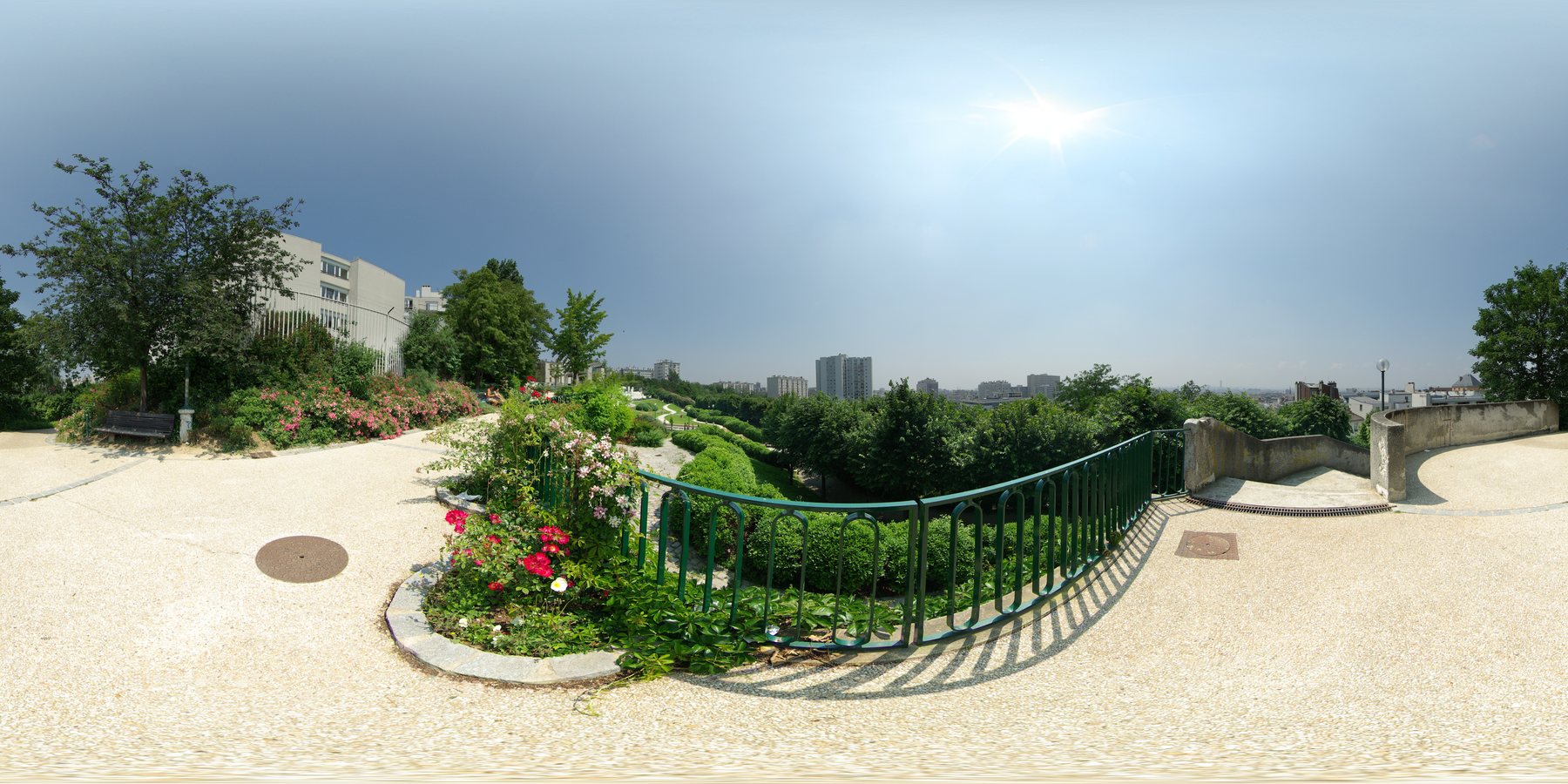 Flower beds and the view across Paris from Parc de Belleville, photographed in 2007