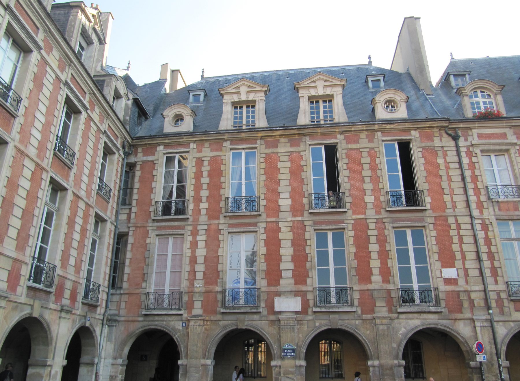 The red-brick Maison de Victor Hugo on Place des Vosges, photographed in 2022