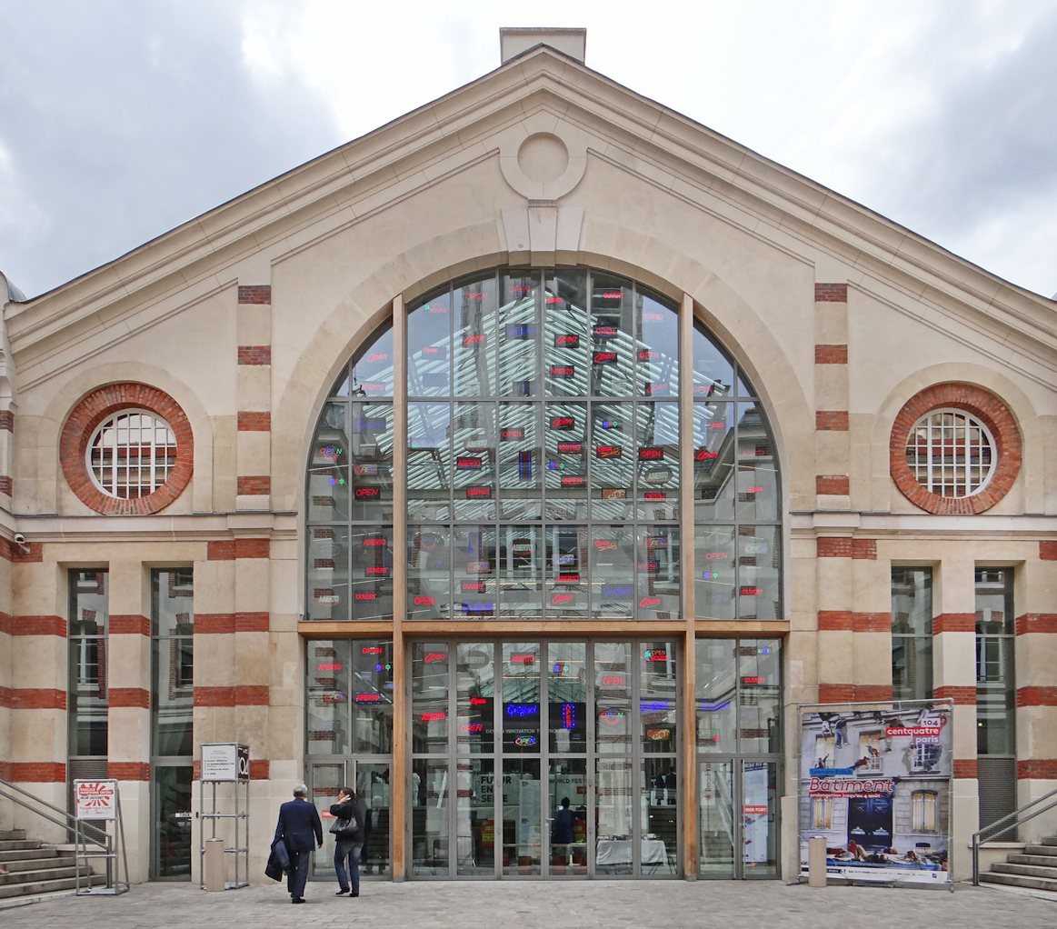 The arched façade of CENTQUATRE-PARIS, photographed in 2012